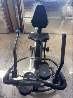 Free step recumbent bike and inversion table like new and in excellent condition