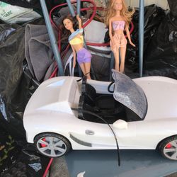 Lnew Barbie Light Up Sports Car And two dolls are for $25