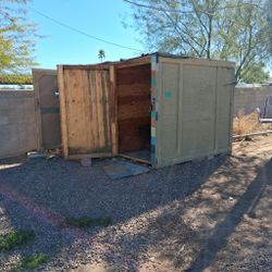 2 wooden sheds