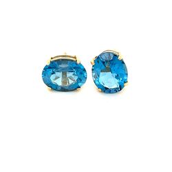 14k Oval Shaped Blue Topaz Stud Earrings