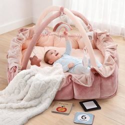 Pink plush baby play mat