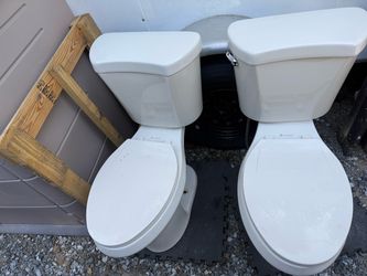 2 Glacier Bay Bone Elongated Toilets – 1.28 GPF