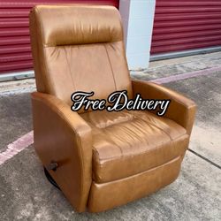Recliner Rocks and Swivels Faux Leather See photos and details