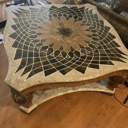 Oversized Wood Coffee Table With Detailed Floral, Geometric Design and Legs Are Carved. 