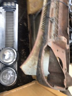 Pontiac grill with 4 headlights.