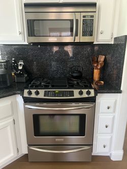 Slide in stainless steel gas stove & matching range  microwave