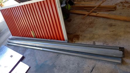 Garage Door, Flashing, Beams, Lumber, And Plywood For Sale.