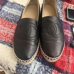 Chanel black slip ons (lamb skin )
