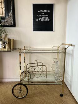 ANTIQUE GOLD + GLASS BAR CART ON WHEELS