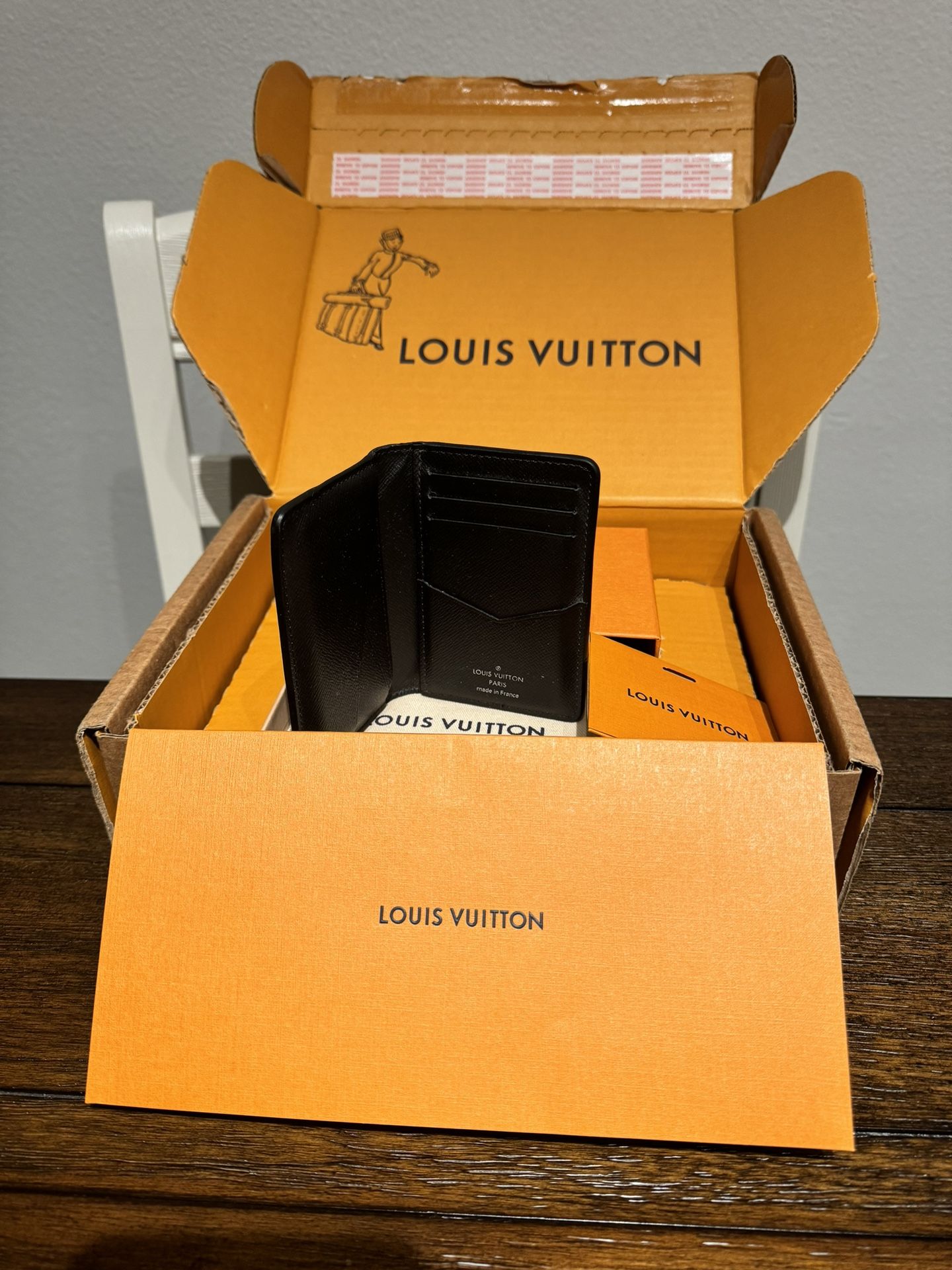 Louis Vuitton Men’s Pocket Fold Taiga Leather 