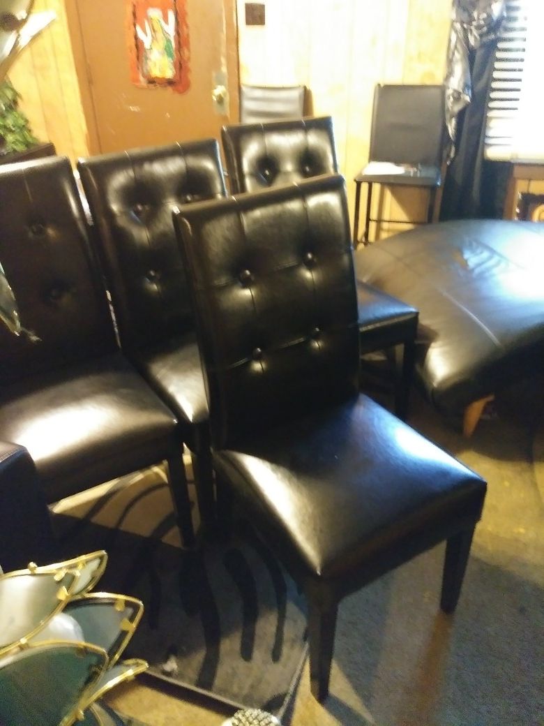 4 black leather chairs excellent condition