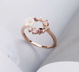 New rose gold plated halo ring