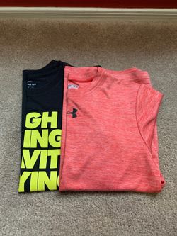 “Boys Medium,”. Nike and Under Armor shirts