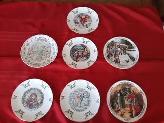 Christmas collector plate set by Royal Doulton