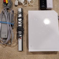 Wii console and assocories  plus games and  U draw