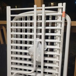 Baby Crib With Mattress And A Bed Sheet