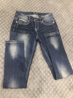 Woman’s size 5 jeans (worn once)