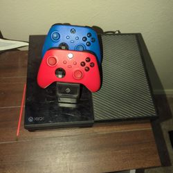 Xbox One And 360 With Games And Controllers