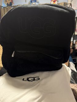This is an UGG Dannie II mini backpack in black suede and sheepskin New 