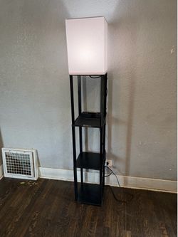 étagère-style organizer standing lamp.