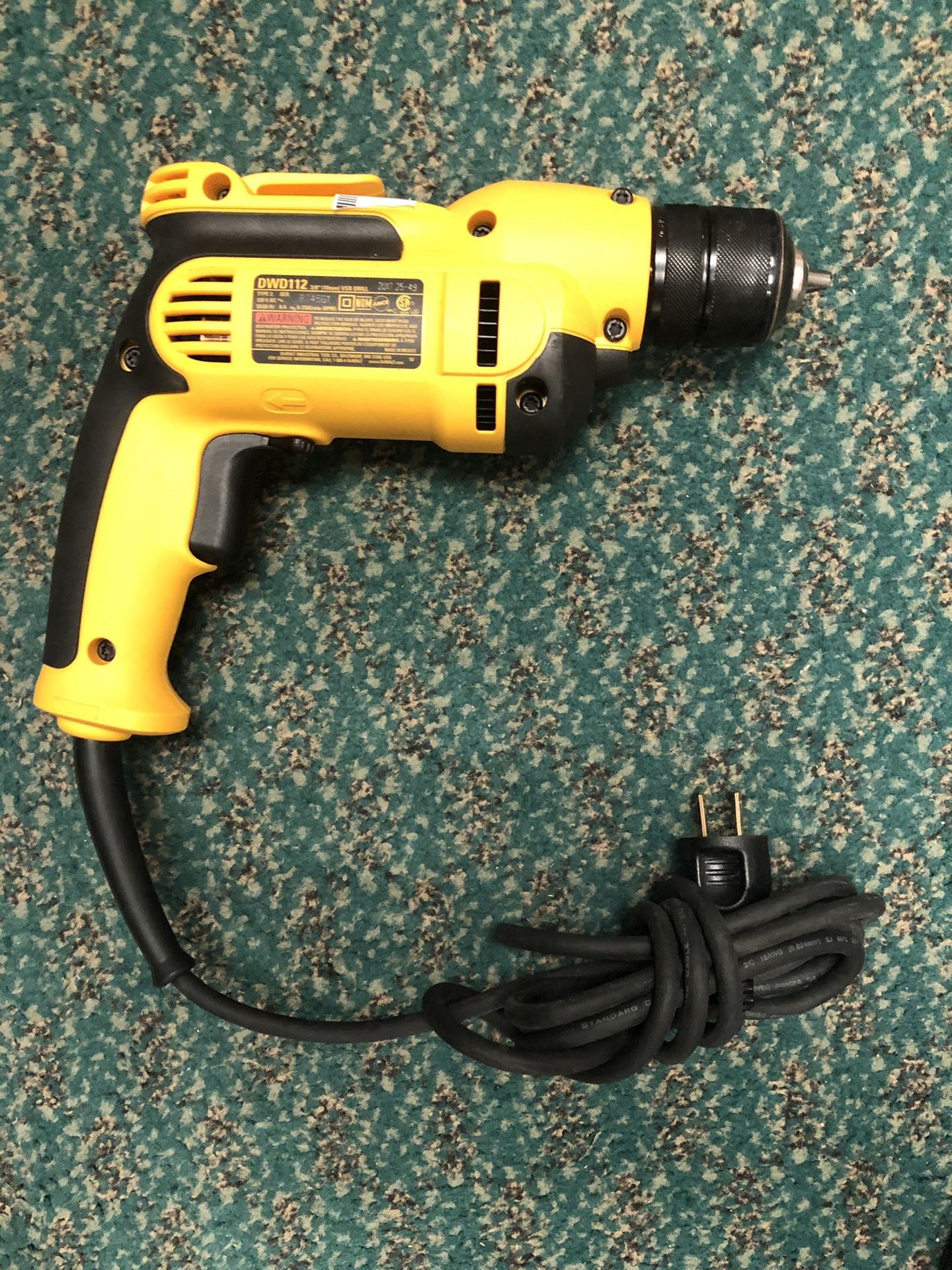 Drill , Tools-Power Dewalt plug in drill .. Negotiable