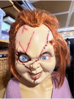 Custom Chucky doll with red hair and stitched face