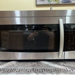 Samsung 1.6-cu ft 29.88-in Over-the-Range Microwave ( Stainless Steel )