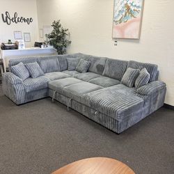Grey corduroy sleeper sofa