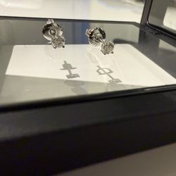 Brand new never worn Moissanite earrings with sterling silver