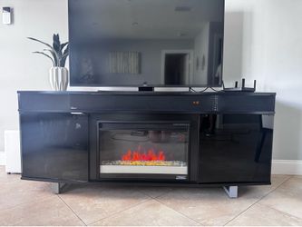 Samsung tv and entertainment center