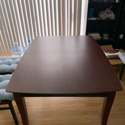 Brown Wooden Dining Table with Attached Leaf