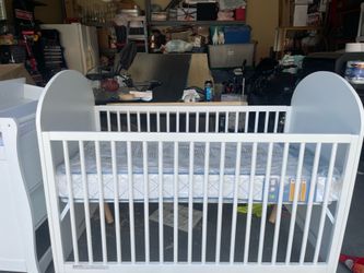 Crib mattress and diaper changer