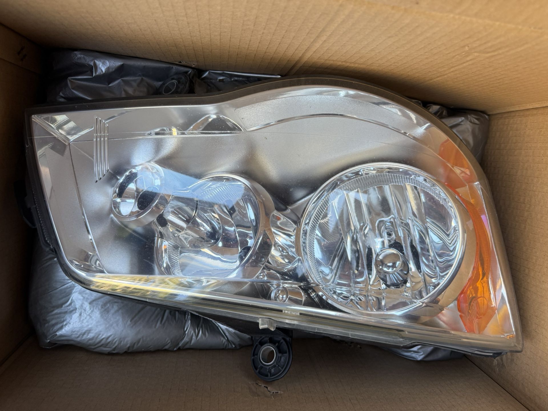 Dodge Caravan OEM Headlight Housing