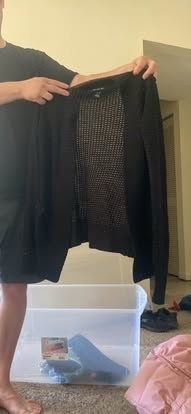 Short length long sleeve sweater