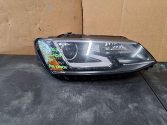 2015-2016 VOLKSWAGEN JETTA RIGHT HID HEADLIGHT OEM USED #11664