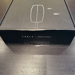 Tesla Mobile Connector, a portable Level 2 charger for electric vehicles.