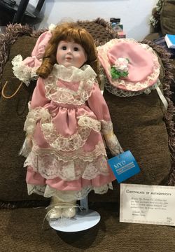 Porcelain doll with stand