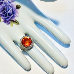 Sterling Silver.925 Stamped Spessartine Garnet And CZ Ring.