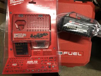 Milwaukee XC6.0 Battery And Charger 