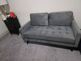 mid-century modern tufted loveseat
