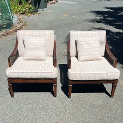 Two Living Room Chairs With Cushions And Pillows 