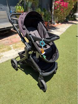 Graco Modes Nest Stroller with baby toys
