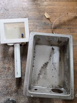 Laundry room water outlet and vent outlet