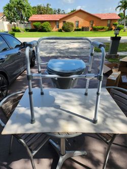 Guardian Steel 3-in-1 Folding Commode, Includes Seat with Lid, Bucket, Armrests, and Splash guard brand new