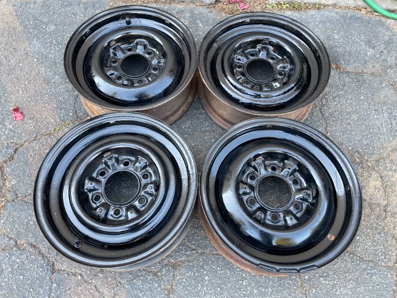Four Chevy or GMC 15x5 inch 6 lug steel rims with clips for hub caps -T03744