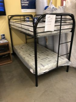 Bunk bed with mattresses
