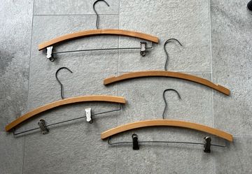 Four Vintage Wood Clothes Hangers.