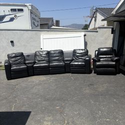 7 Year Old Black leather Couch Set-  Seats 5 And All Recline 