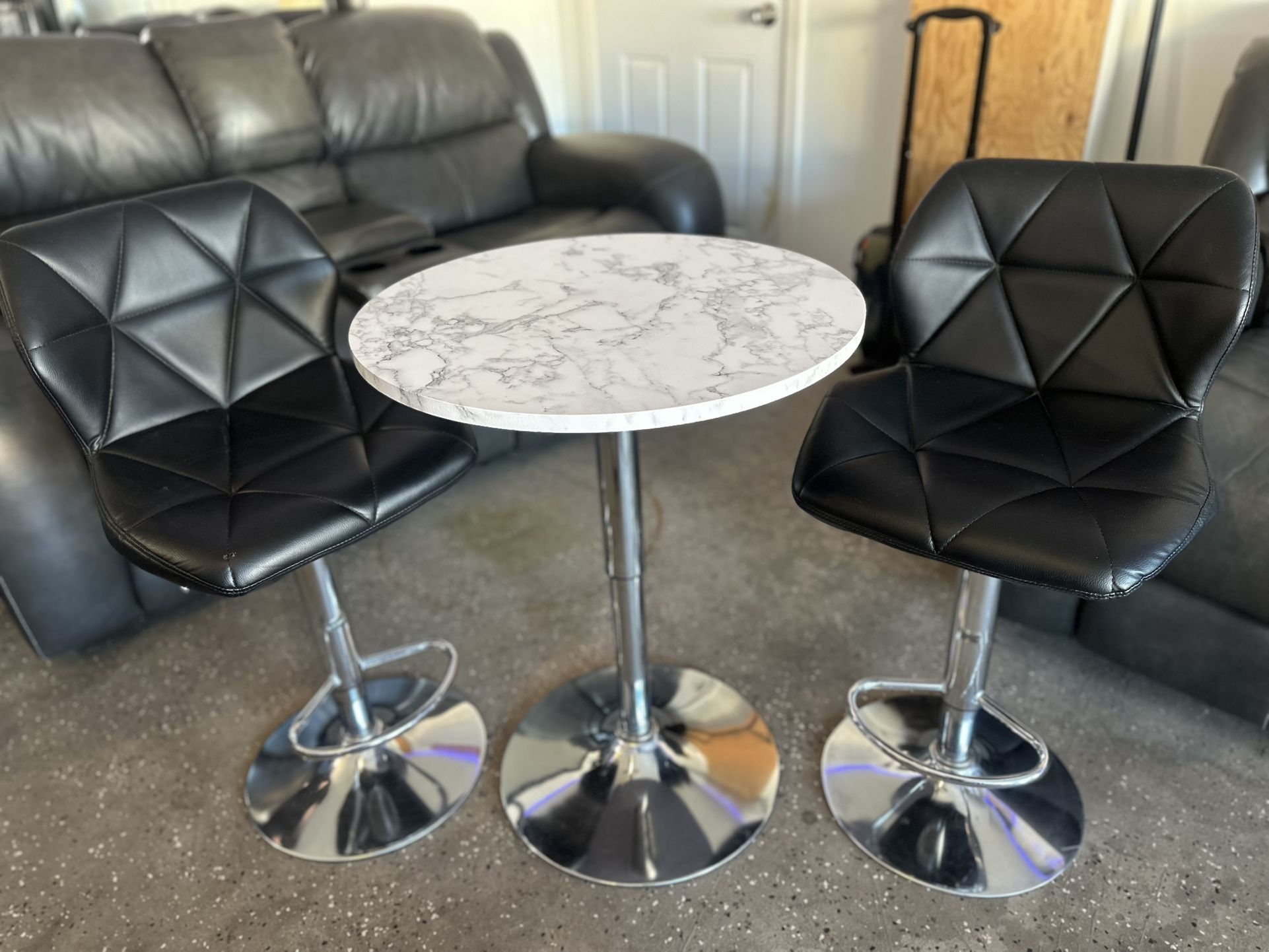 Marble Bar Table and Black Chairs
