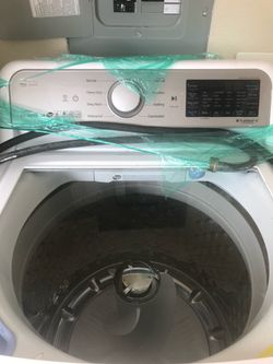 LG washer, 2 years old 27inch wide by 37inch H